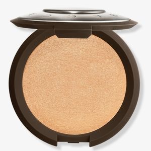 BECCA SHIMMERING SKIN PERFECTOR in CHAMPAGNE POP